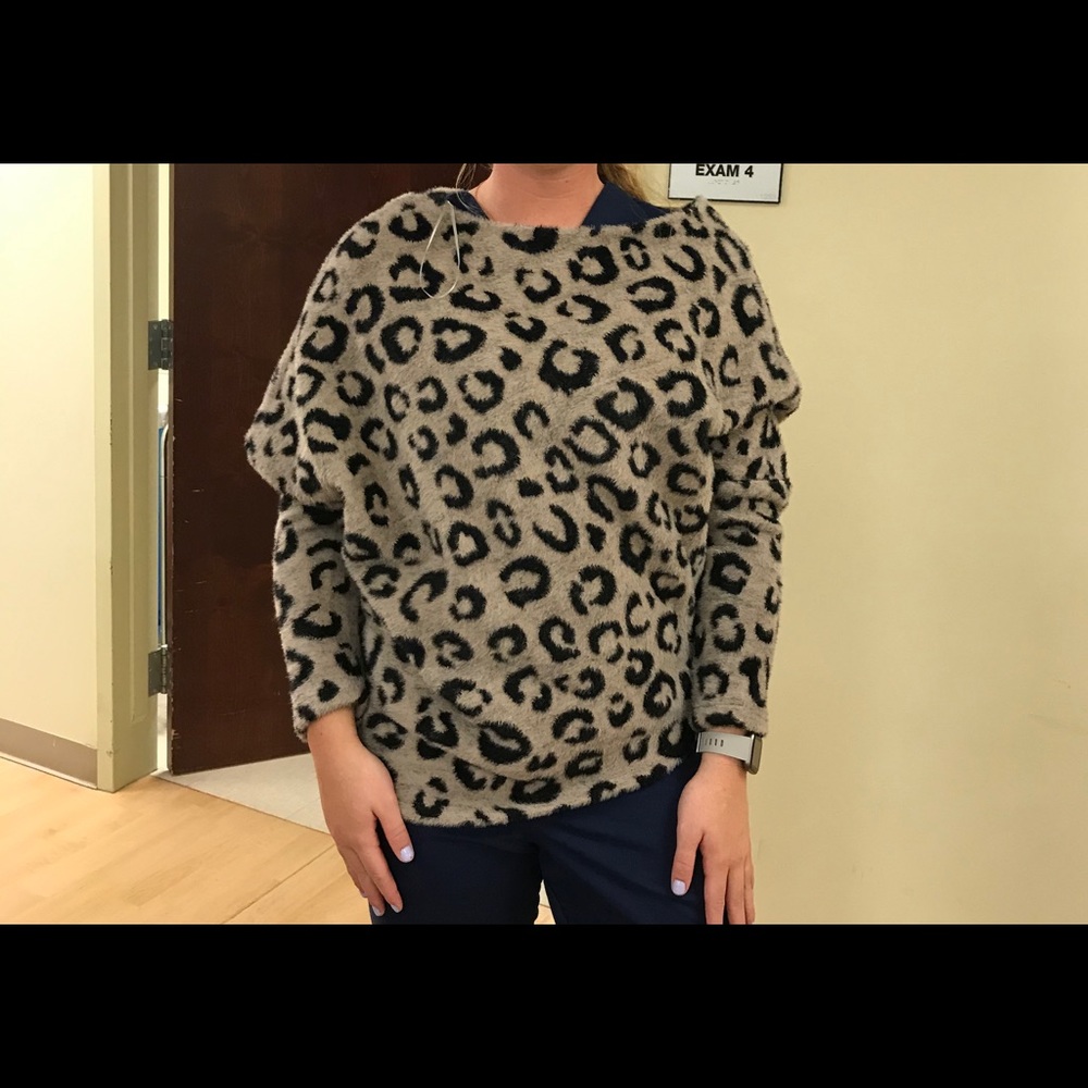 Leopard asymmetrical textured top
